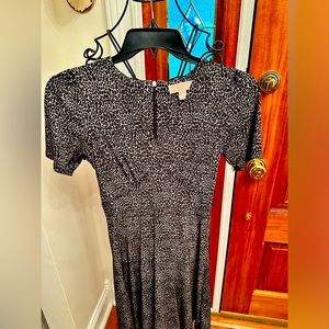 Cheetah print black dress with back zipper detail! Like new condition!